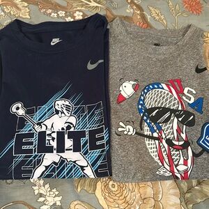 Two Nike Dri-Fit Lacrosse Themed Shirts